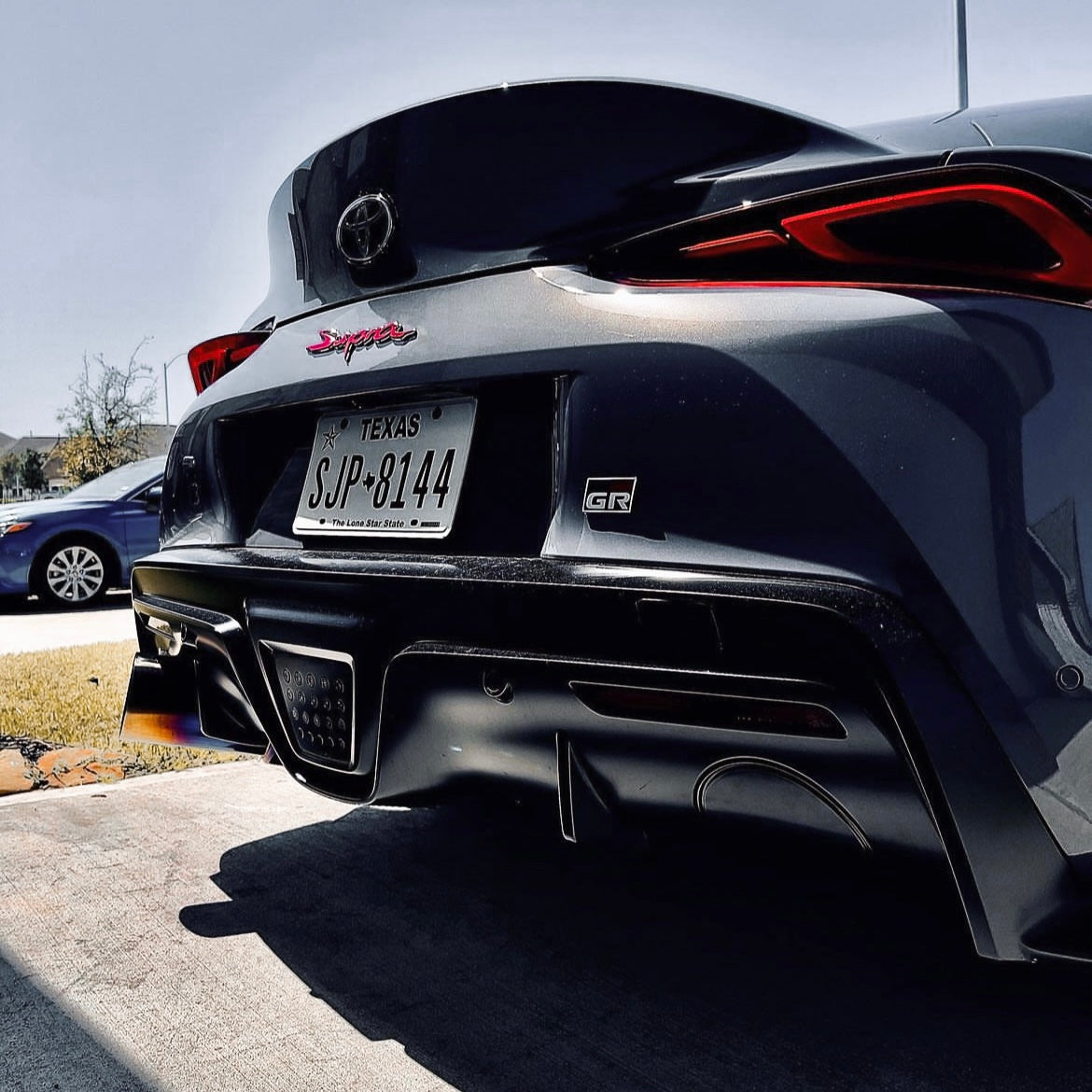 OEM+ Designs Exhaust Cutout Cover for Toyota GR Supra (A90/91)